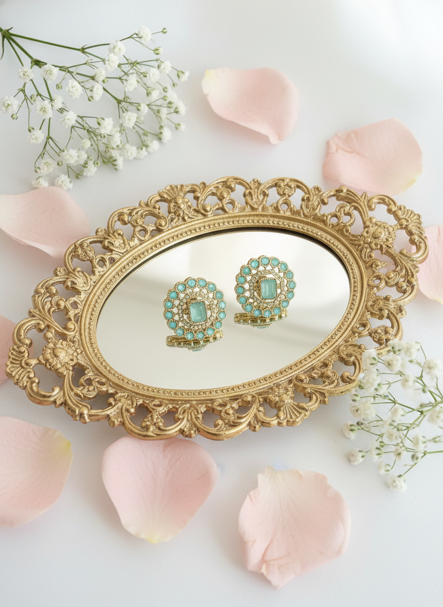 Turquoise earrings on vintage tray