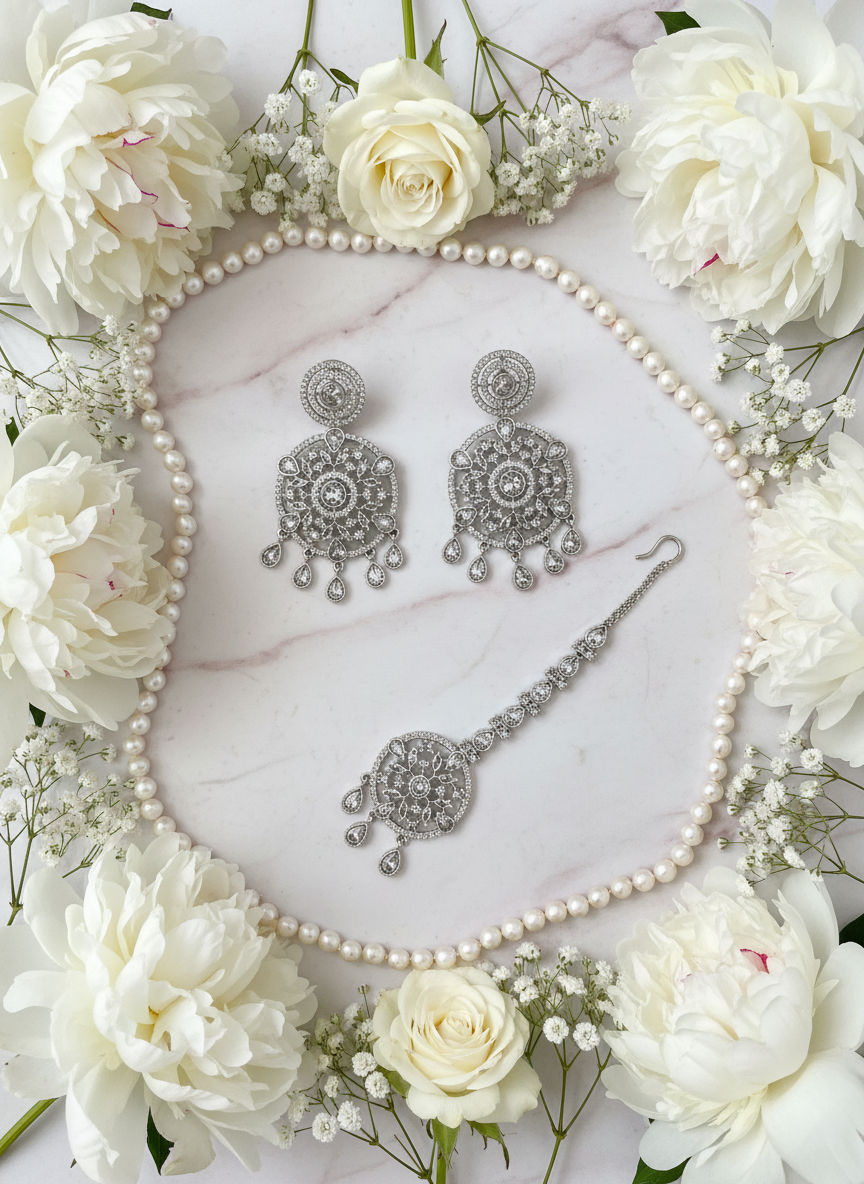 Chandelier set with white marble and floral styling