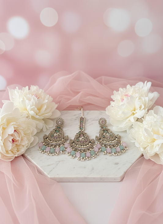 Earrings & Tikka Set with elegant floral background