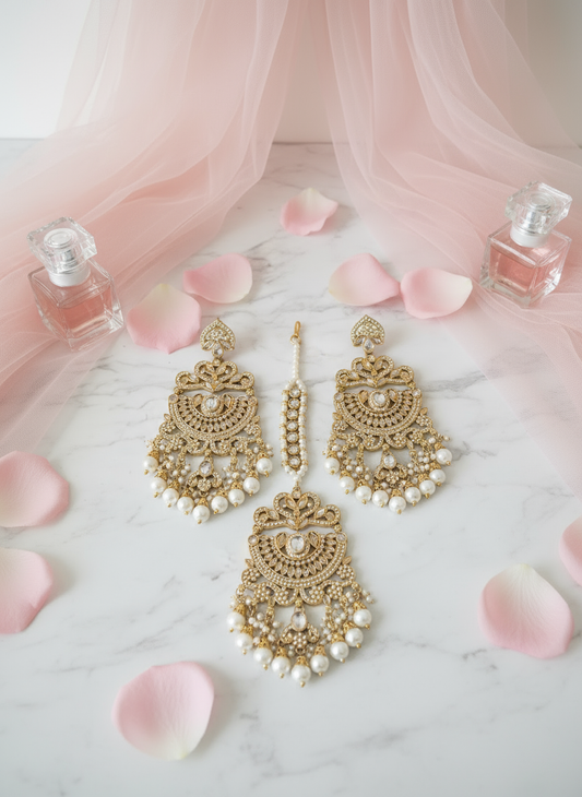 Gold Jewellery Set on Marble with Pink Background