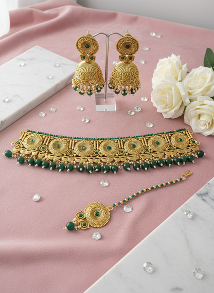 Green stone set with roses and diamonds