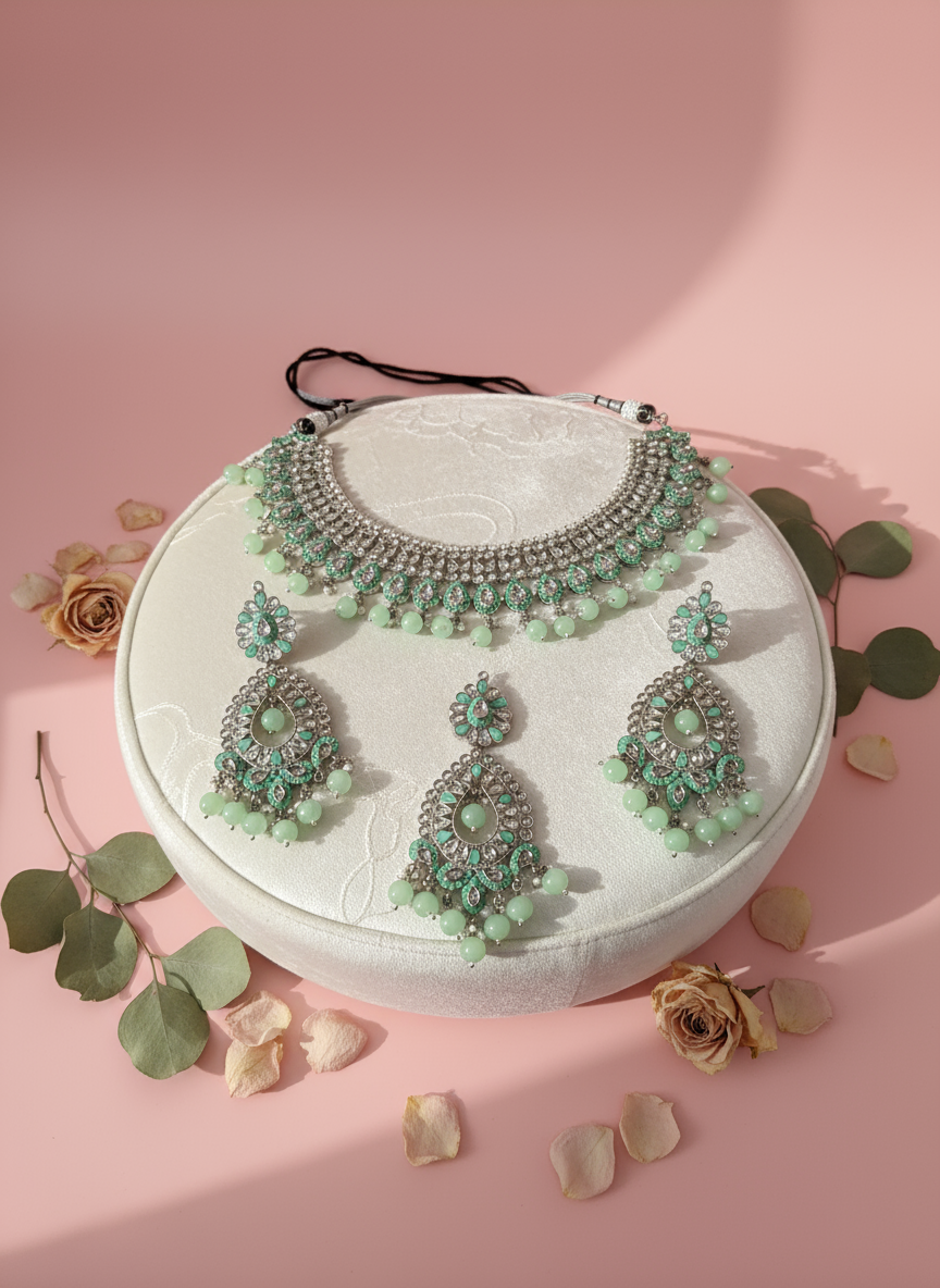 Jewellery arranged on luxury cushion with florals