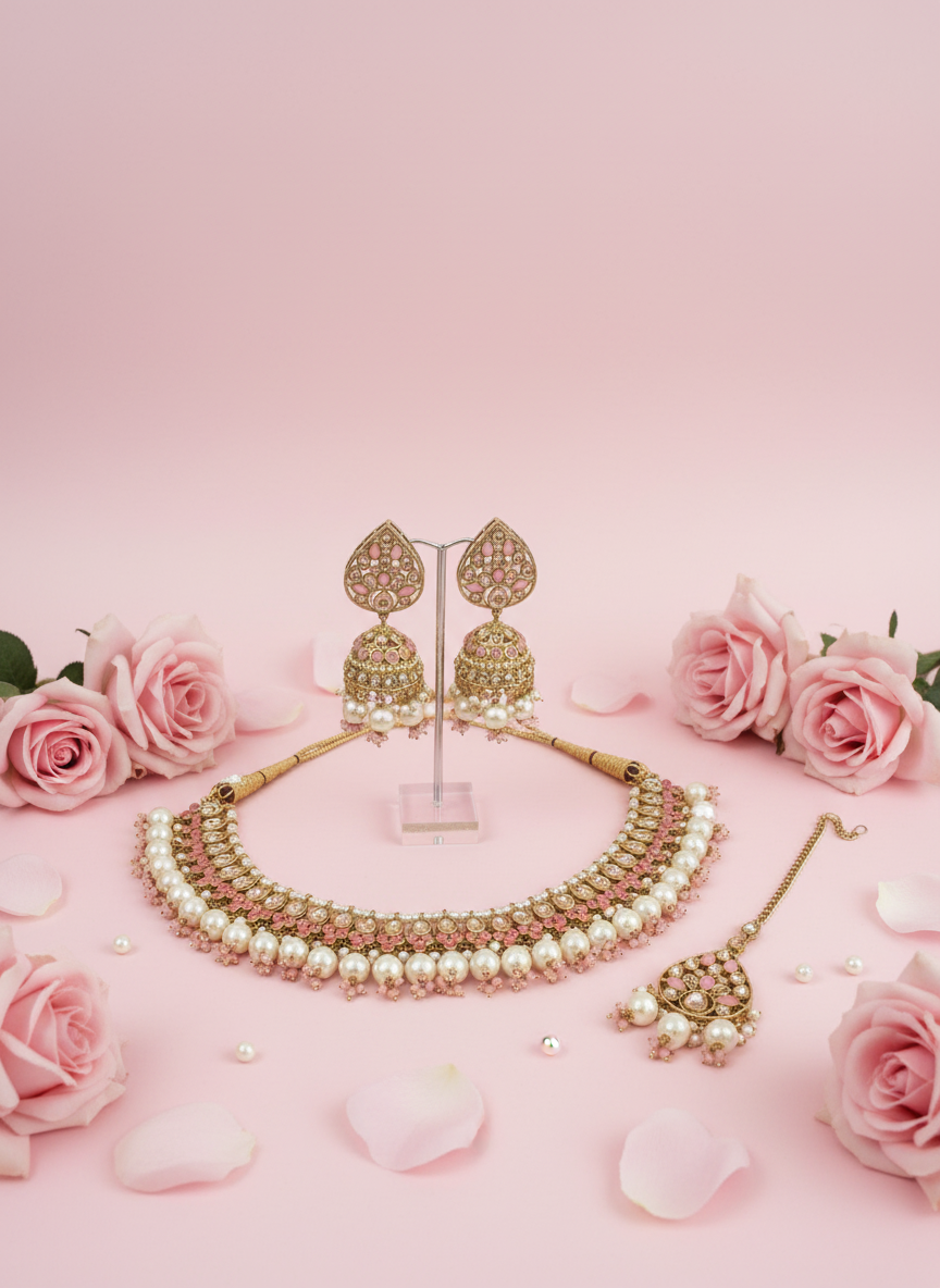 Jewelry on clean pink gradient