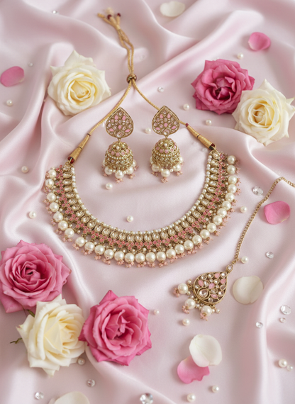 Jewelry on pink silk fabric