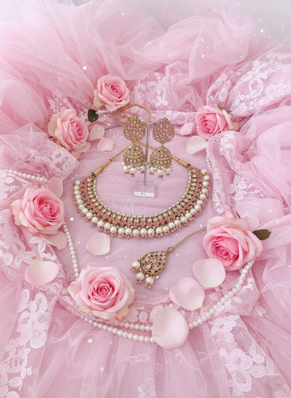 Jewelry on pink tulle and lace