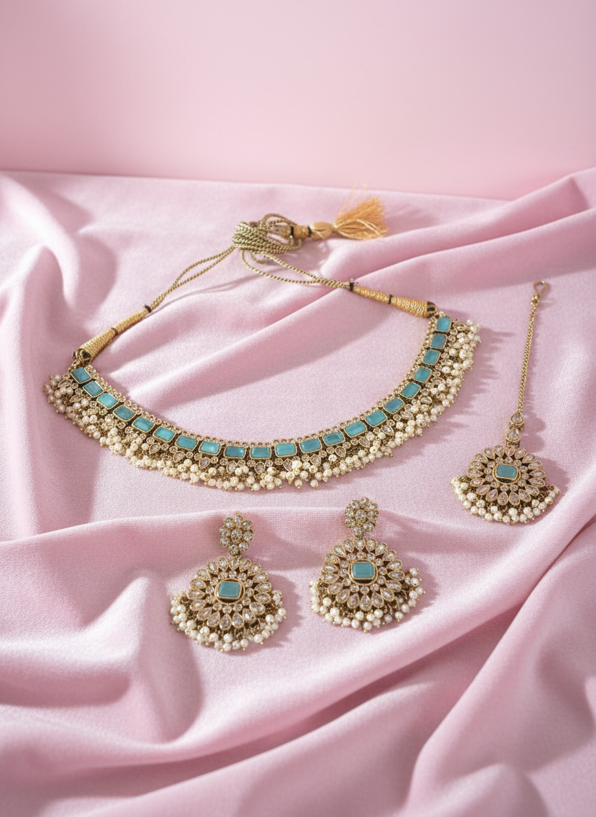Jewelry set on pastel pink background