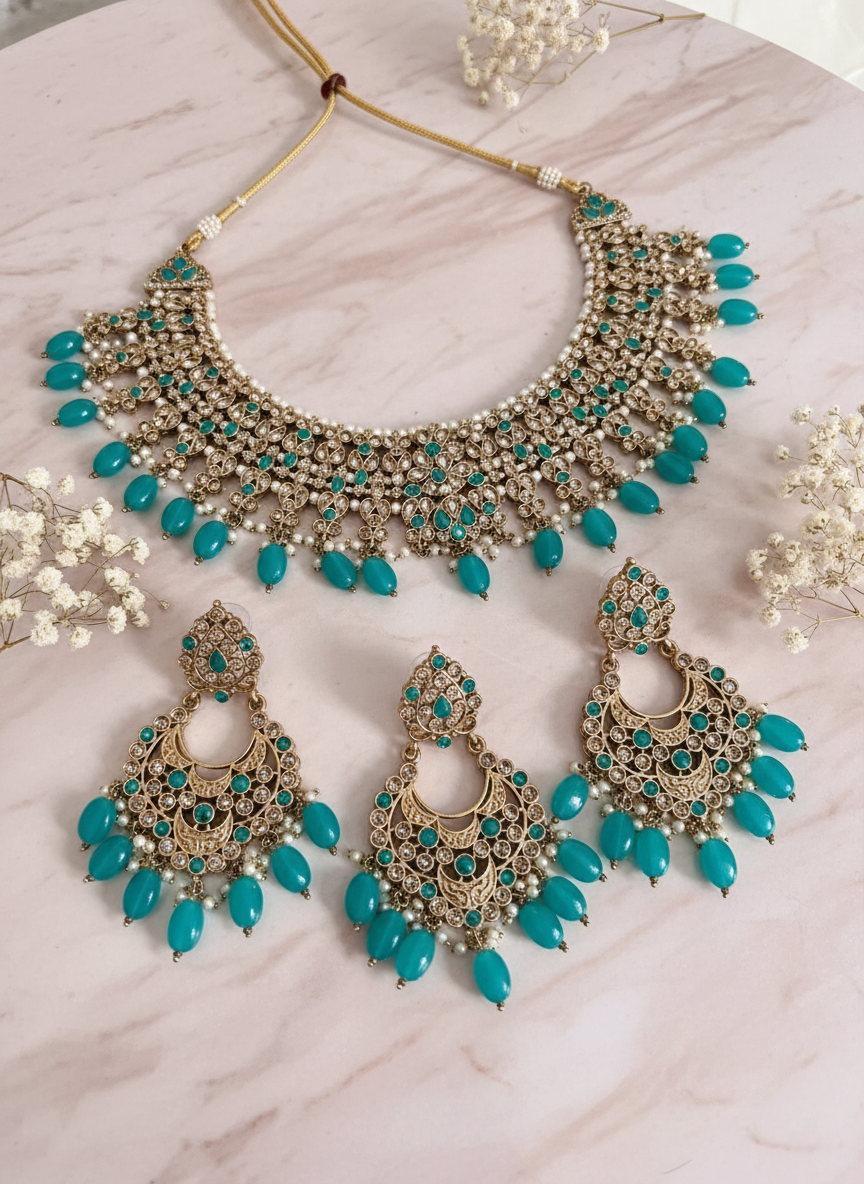 Jewelry set on pink marble