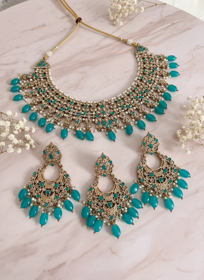 Jewelry set on pink marble