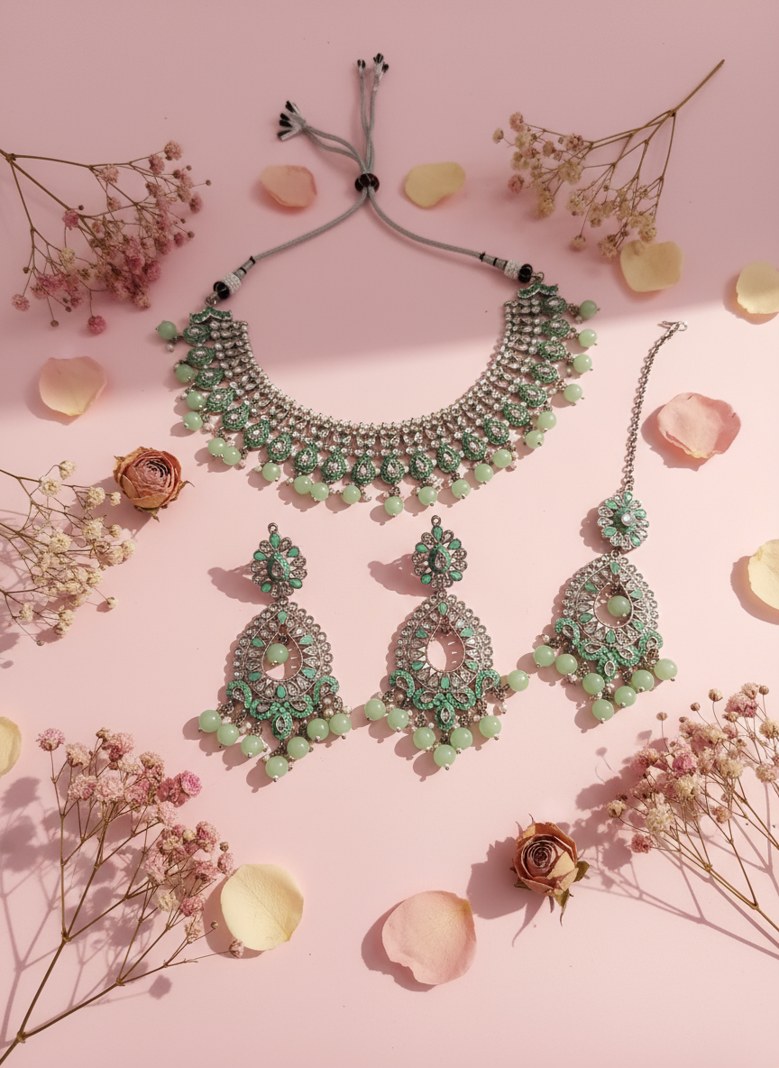 Luxury pink background setup with jewellery, dried flowers and rose petals