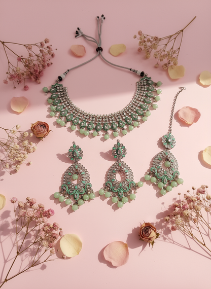 Luxury pink background setup with jewellery, dried flowers and rose petals