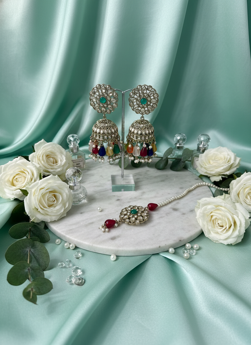 Multicolor kundan jewelry on mint silk with roses