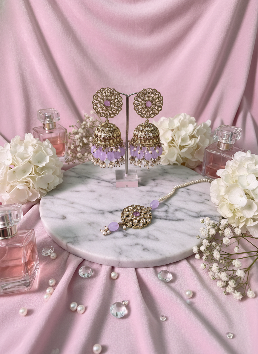 Purple kundan jewelry with hydrangeas on velvet