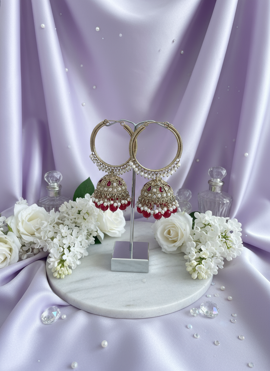 Red kundan bali earrings on pastel lavender