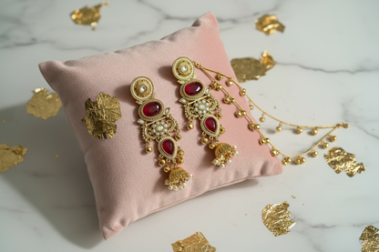 Ruby Red Earrings on Pink Velvet Cushion