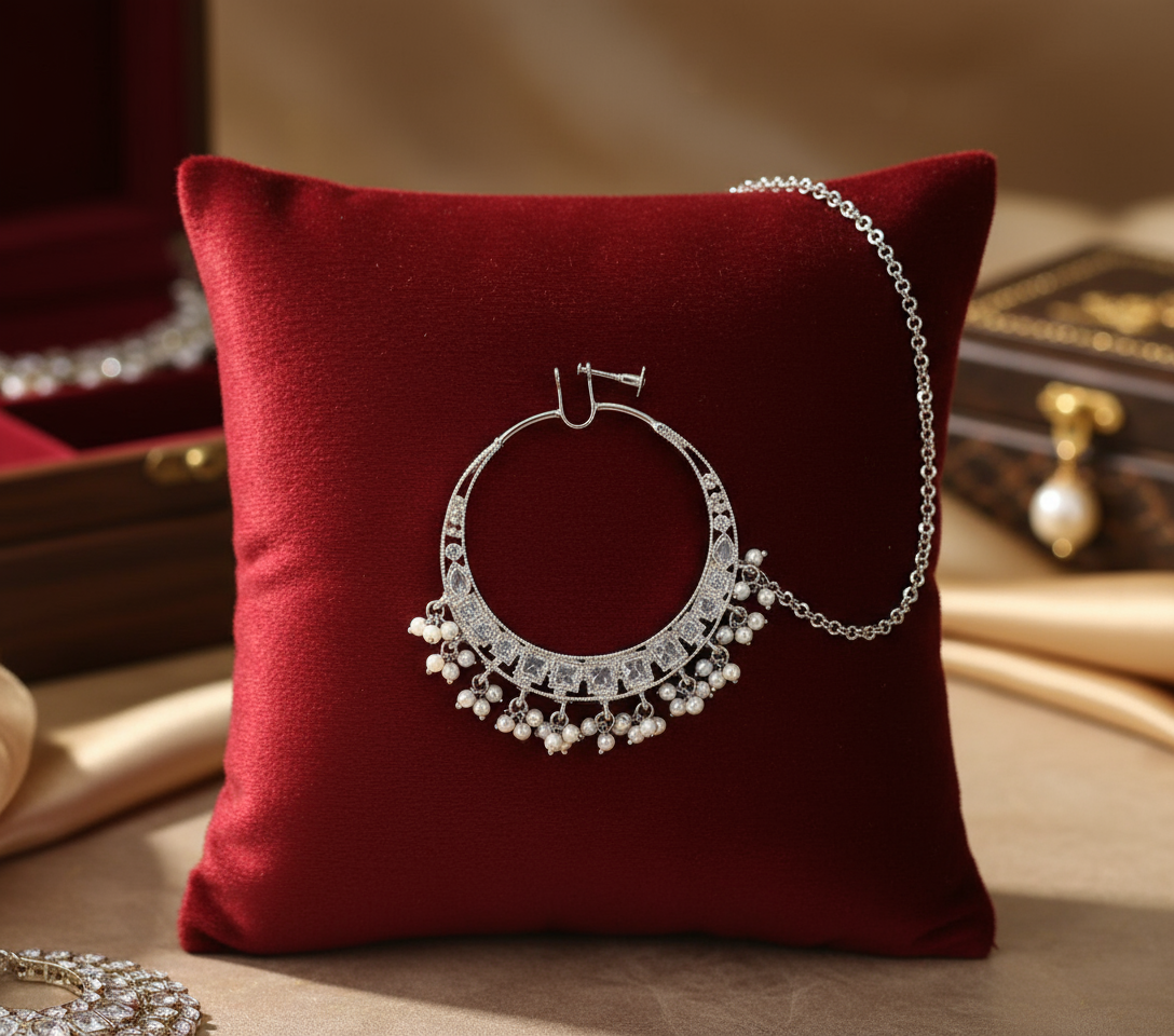 Silver nose ring centered on cushion