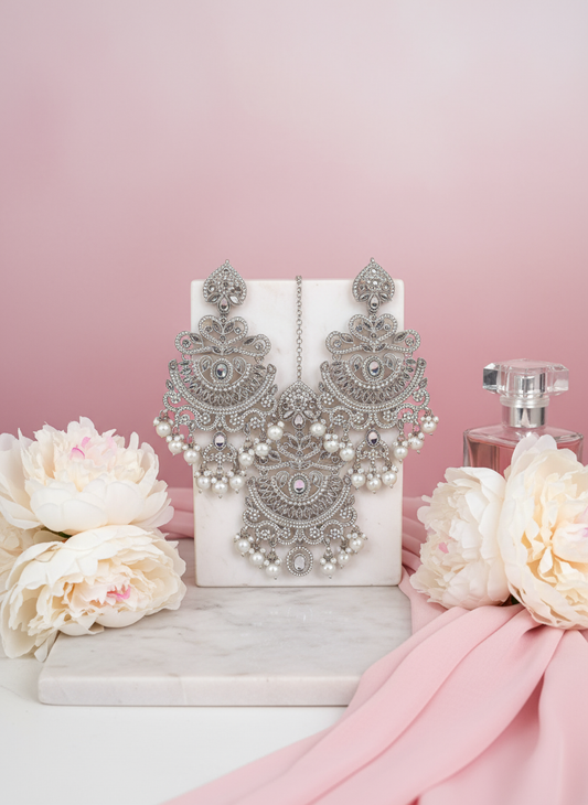 Silver & White Pears Earrings Tikka Set with elegant background