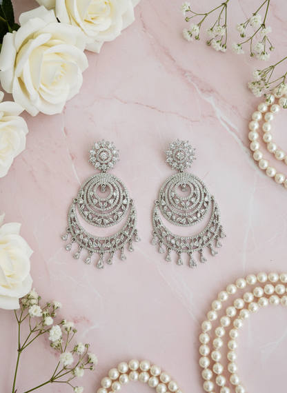 Statement chandbali earrings with pastel pink styling