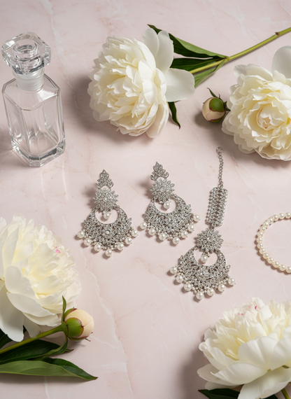 Styled jewellery set with pink background