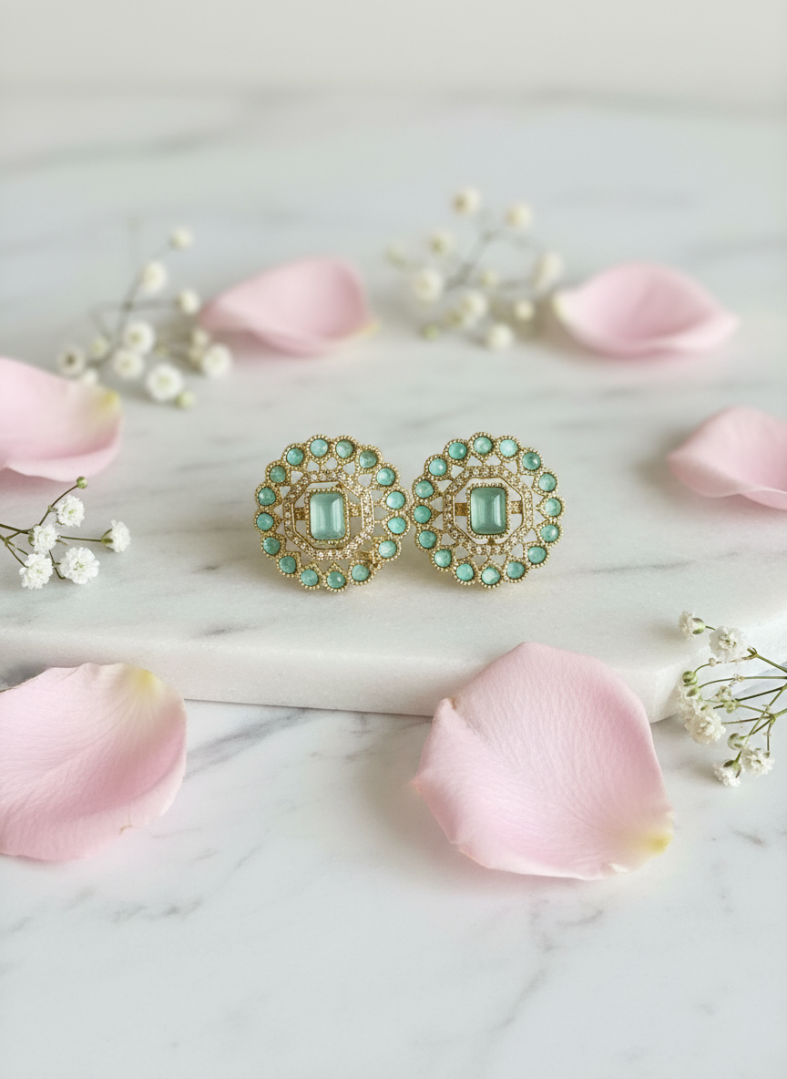 Turquoise earrings clean composition
